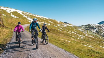 Drei Fahrradfahrer