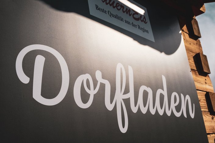 Dorfladen Schild